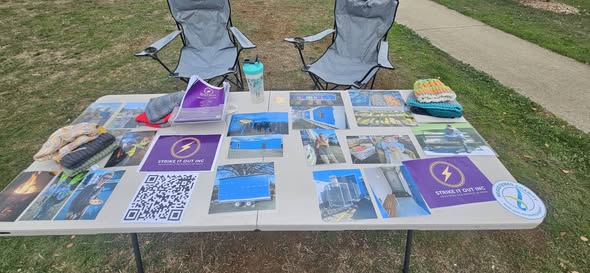 Strike It Out Inc Informational Table Connects Launceston Families
