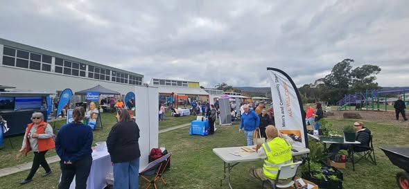 Strike It Out Inc Information Table Features at Launceston Community Event